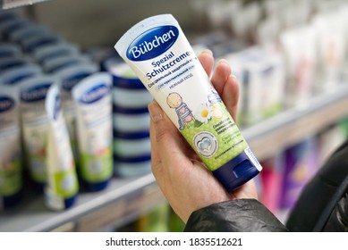 Moscow, Russia - 10.17.2020: Womens hand hold german Bubchens protective cream for babys  - Shutterstock ID 1835512621