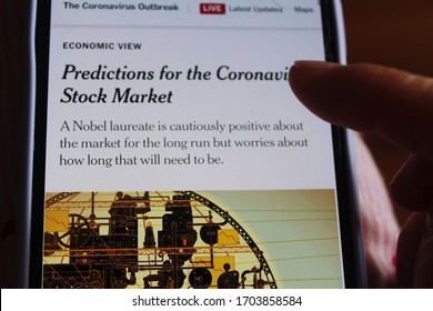 Moscow, Russia - 11 April 2020: The New York Times Article About Predictions For The Coronavirus Stock Market On A Mobile Screen.