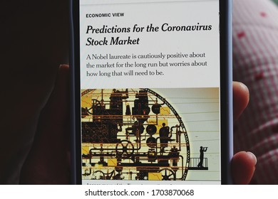 Moscow, Russia - 11 April 2020: The New York Times Article About Predictions For The Coronavirus Stock Market On A Mobile Screen.