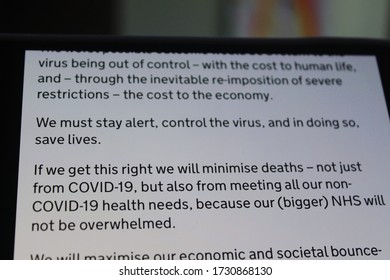 Moscow, Russia - 13 May 2020: Mobile Phone Screen With The Phase One Text Of The Document Our Plan To Rebuild - The UK Governments COVID-19 Recovery Strategy. UK Government Website.