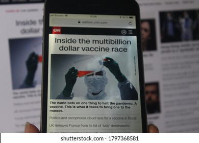 Moscow, Russia - 14 August 2020: CNN News With Headlines On Inside The Multibillion Dollar Vaccine Race On Smartphone Screen. Coronavirus Pandemic Concept.