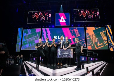 MOSCOW, RUSSIA - 14th SEPTEMBER 2019: Esports Event Of A Counter Strike Game. Winners Of A Standoff Tournament Team Ninjas In Pyjamas With A Check In Their Hands With A Prize Money.