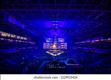 MOSCOW, RUSSIA - 14th SEPTEMBER 2019: esports Counter-Strike: Global Offensive event. Big illuminated main stage of a computer games tournament located on a big stadium. Tribunes are full of video