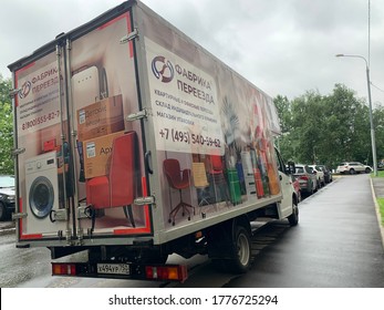 Moscow, Russia - 15 July 2020: Furniture Delivery Van Parked Outside In Residential Area. Translation In Russian Means Furniture Movers.