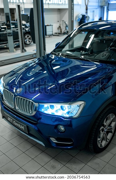 Moscow, Russia - 16.08.2021:
Luxury BMW X3 SUV in the auto sercive repair shop on regular oil
service