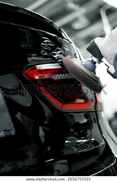 Moscow, Russia -\
16.08.2021: Luxury BMW X6 SUV in the auto sercive repair shop on\
polish and detailing\
works