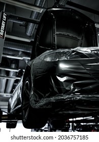 Moscow, Russia - 17.08.2021: Luxury BMW M6 E63 in the auto service repair shop on engine repair