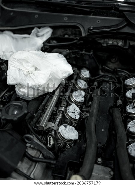 Moscow, Russia - 17.08.2021: Luxury
BMW M6 E63 in the auto service repair shop on engine
repair