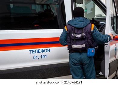 Moscow, Russia. 30th March, 2022  An employee of the Ministry of Emergency Situations of Russia gets into a special service car in Moscow, Russia