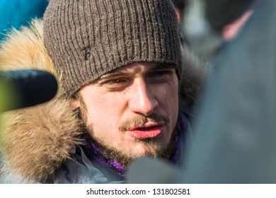 MOSCOW, RUSSIA - 8 MARCH: Pyotr Verzilov, Nadezhda Tolokonnikova's husband, being interviewed on picket to free Pussy Riot members on March 8, 2013 in Moscow.