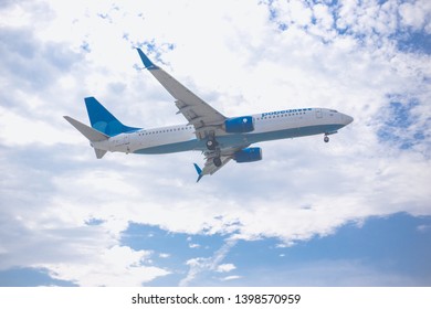 Moscow, Russia - 9 May 2019: Close-up Of A Passenger Plane Of An Airline Pobeda Flying On A Blue Sky