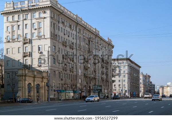 Moscow, Russia, April 11, 2021: View of busy\
Earthen Rampart street with driving cars and buildings behind.\
Traffic flow in Moscow