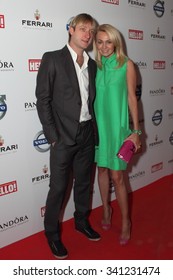 MOSCOW, RUSSIA, April, 18, 2012: Russian Figure Skater Evgeni Plushenko And His Wife Yana Rudkovskaya, Hello! Magazine Awards 