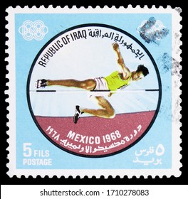 MOSCOW, RUSSIA - APRIL 18, 2020: Postage Stamp Printed In Iraq Shows High Jump, Summer Olympics 1968, Mexico City Serie, Circa 1969