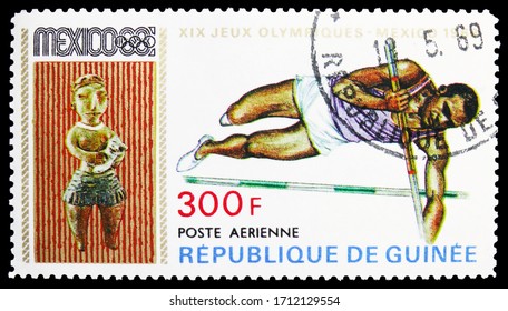 MOSCOW, RUSSIA - APRIL 18, 2020: Postage Stamp Printed In Guinea Shows Pole Vaulting, Summer Olympics 1968, Mexico Serie, Circa 1969