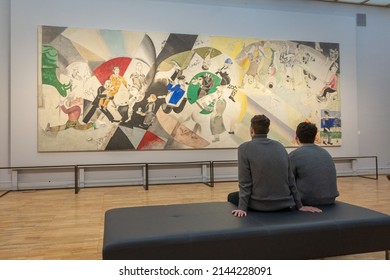 Moscow, Russia - April 2, 2022: State New Tretyakov Gallery on Krymsky Val. People look at painting by Marc Chagall in halls of gallery. Modern contemporary art