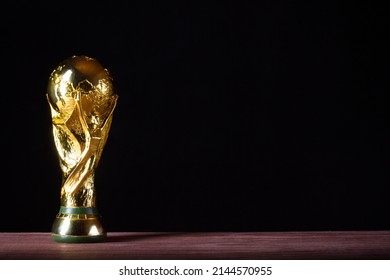 Moscow, Russia - April, 2022: FIFA World Cup Trophy against black background