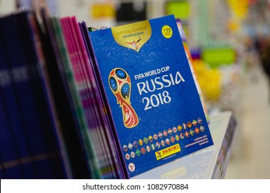 MOSCOW, RUSSIA - APRIL 27, 2018: Official album for stickers dedicated to the World Cup on the shelf of the Auchan supermarket with the symbols of the FIFA World Cup RUSSIA 2018.