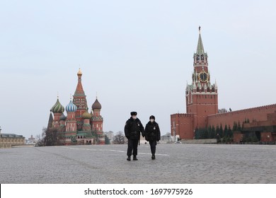 MOSCOW, RUSSIA – APRIL 3, 2020: Covid-19, quarantine in Moscow city. Police. Covid-19, coronavirus in Russia. Red Square without people. Empty street. Kremlin. Pandemic corona virus. Protective masks