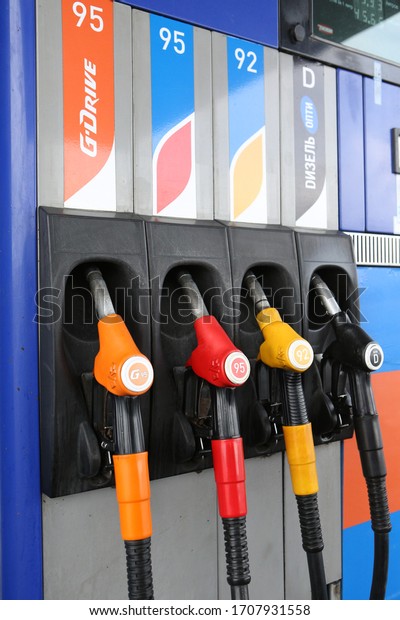 MOSCOW, RUSSIA – APRIL 3, 2020: Gas station in\
car service. Petrol pump filling nozzles. Vehicle fueling facility.\
Automobile refuel. Oil, fuel prices rose in Moscow city. Economy,\
business. Gasoline