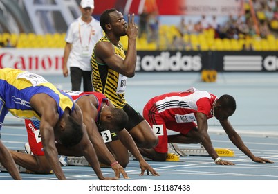MOSCOW, RUSSIA - AUGUST 10: Usain Bolt prepares to stert at the World Athletics Championships on August 10, 2013 in Moscow