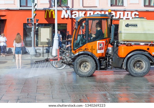 Moscow, Russia, August\
2018: View of the Cleaning  machine washing the streets of the city\
(editorial)
