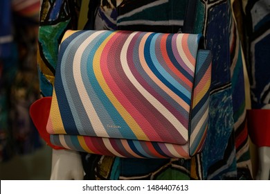 Moscow, Russia - August 2019: Paul Smith Multi-Colored Shoulder Bag. Interior Of Luxury Clothing Store Paul Smith In Moscow.