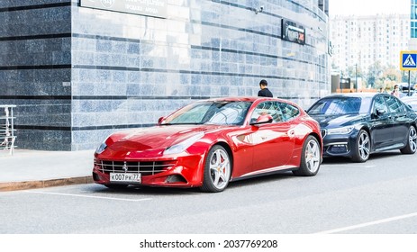 Moscow, Russia - August 2021: Red Ferrari FF (Type F151) Car Parked On The Street Of City Center. Front Side View Of 3-door Shooting-brake Body Style, Super Car