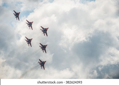 MOSCOW, RUSSIA - AUGUST 25-30: Civil airplanes making aerobatic manoeuvres at the International Aviation and Space salon MAKS 2015, August 25-30, 2015 at Zhukovsky, Russia - Shutterstock ID 382624393