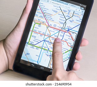 Moscow, Russia - August 26, 2014: London Underground diagram on the tablet. London Underground is one of the largest in the world, its network consists of 11 lines with a total length of 402 km.