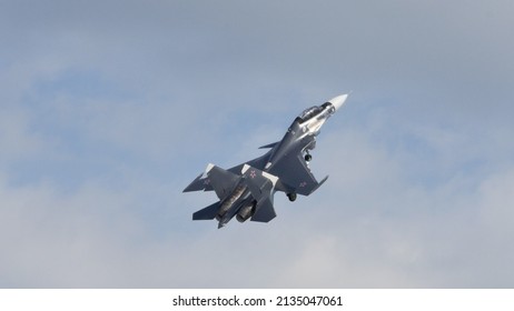 Moscow Russia AUGUST, 26, 2015 Military Fighter Jet Plane Rise Quickly In The Sky. Copy Space For News Title. Sukhoi Su-30 Flanker Of Russian Navy Is A Supermaneuverable Multirole Fighter Jet Aircraft