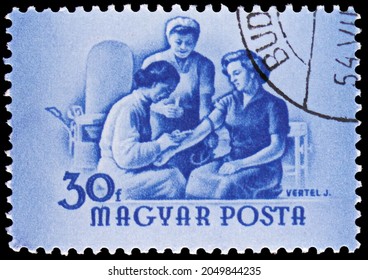 MOSCOW, RUSSIA - AUGUST 4, 2021: Postage Stamp Printed In Hungary Shows Blood Test, International Womens Day Serie, Circa 1954