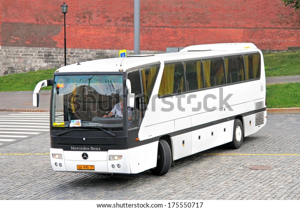 MOSCOW, RUSSIA -\
AUGUST 7, 2012: White Mercedes-Benz O350RHD Tourismo interurban\
coach at the city\
street.