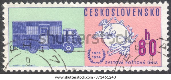 MOSCOW, RUSSIA - CIRCA JANUARY, 2016: a post\
stamp printed in CZECHOSLOVAKIA shows Postal Union Emblem &\
Early mail truck, the series \