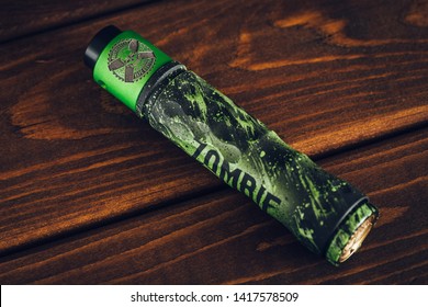 Moscow, Russia - Circa June 2019 : Vape Device. Rockvape Mechanical Mod And Bro RDA From Brotherhood Vape Custom In Green Color On Wooden Background. Vaping - Alternetive Smoking And Subculture.