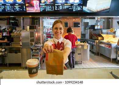 MOSCOW, RUSSIA - CIRCA MAY, 2018: worker at McDonald's. McDonald's is an American hamburger and fast food restaurant chain.