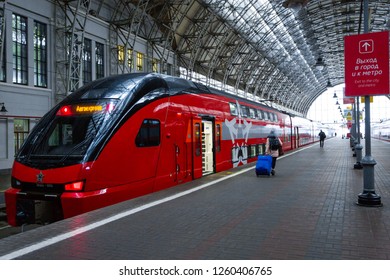 Moscow, Russia - December 10, 2018: Moscow Aeroexpress Station and Red Kiss Rus train.