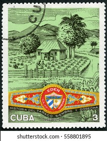MOSCOW, RUSSIA - DECEMBER 17, 2016: A stamp printed in Cuba shows Plantation, Eden cigar band, Cuban Cigar Industry, 1970