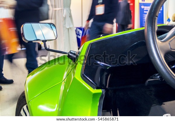 MOSCOW, RUSSIA -\
December 20, 2016: Exhibition Connected Car 2016. The exhibition\
showing all the technological advances in the industry connected\
cars. Focus on mirror.