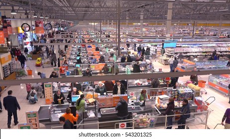 MOSCOW, RUSSIA - DECEMBER, 25, 2016. Customers At Supermarket Checkout Area. High Angle Shot