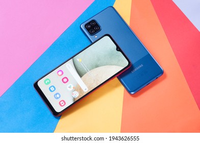 Moscow, Russia - February 11, 2021: Smartphone Samsung Galaxy A12 SM-A125F on a colored background.