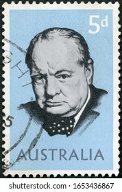 MOSCOW, RUSSIA - FEBRUARY 13, 2020: A Stamp Printed In Australia Shows Sir Winston Leonard Spencer Churchill (1874-1965), Statesman And WWII Leader, 1965 