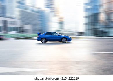 Moscow, Russia - February 2022: Car Subaru Impreza WRX STI Fast Speed Driving On City Road At Daytime