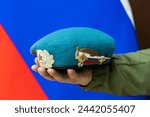 Moscow. Russia - February 21, 2024 Russian Airborne beret. Symbol of the Army Airborne Forces Airborne Troops. Russian Army soldier holds his head beret against.