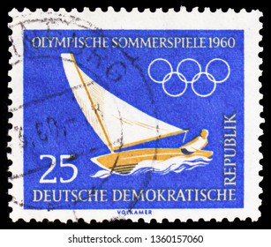 MOSCOW, RUSSIA - FEBRUARY 22, 2019: A Stamp Printed In Germany Shows Sailing, Summer And Winter Olympics 1960, Serie, Circa 1960