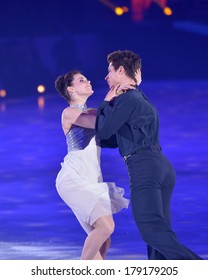 MOSCOW, RUSSIA - FEBRUARY 24, 2014: Tessa Virtue And Scott Moir In Action During Gala Concert Of Olympic Champions In Figure Skating In Luzhniki