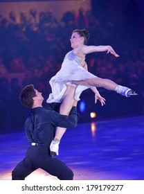 MOSCOW, RUSSIA - FEBRUARY 24, 2014: Tessa Virtue And Scott Moir In Action During Gala Concert Of Olympic Champions In Figure Skating In Luzhniki