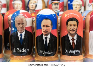 Moscow , Russia - February 26, 2022: Putin, Biden and Xi Jinping in the form of Russian nesting dolls in a gift shop in Moscow. Relations between Russia, USA and China