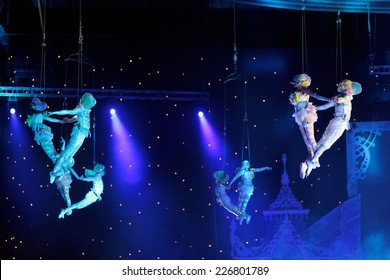 MOSCOW, RUSSIA - JAN 06, 2013: Children's new year performance "Circus Santa Claus II - Olympic New Year" in Olympic Stadium (sport complex). The performance of the trapeze artists