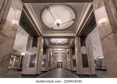 MOSCOW, RUSSIA - Jan 08, 2022: Linear Perspective View Of A Metro Station Semyonovskaya With Marble Columns And Straight Row Of Big Round Lamps On A Ceiling